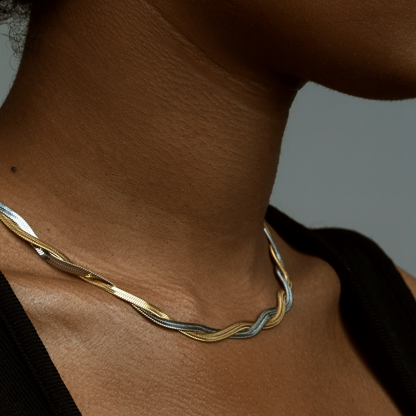 Mixed metal double herringbone chain