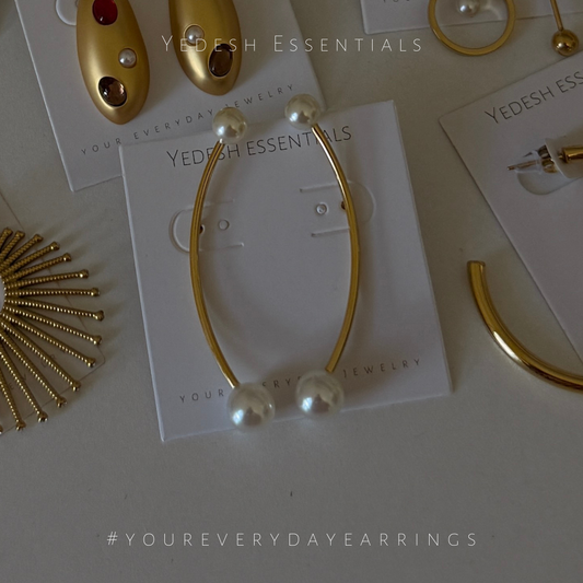Double pearl arc earrings