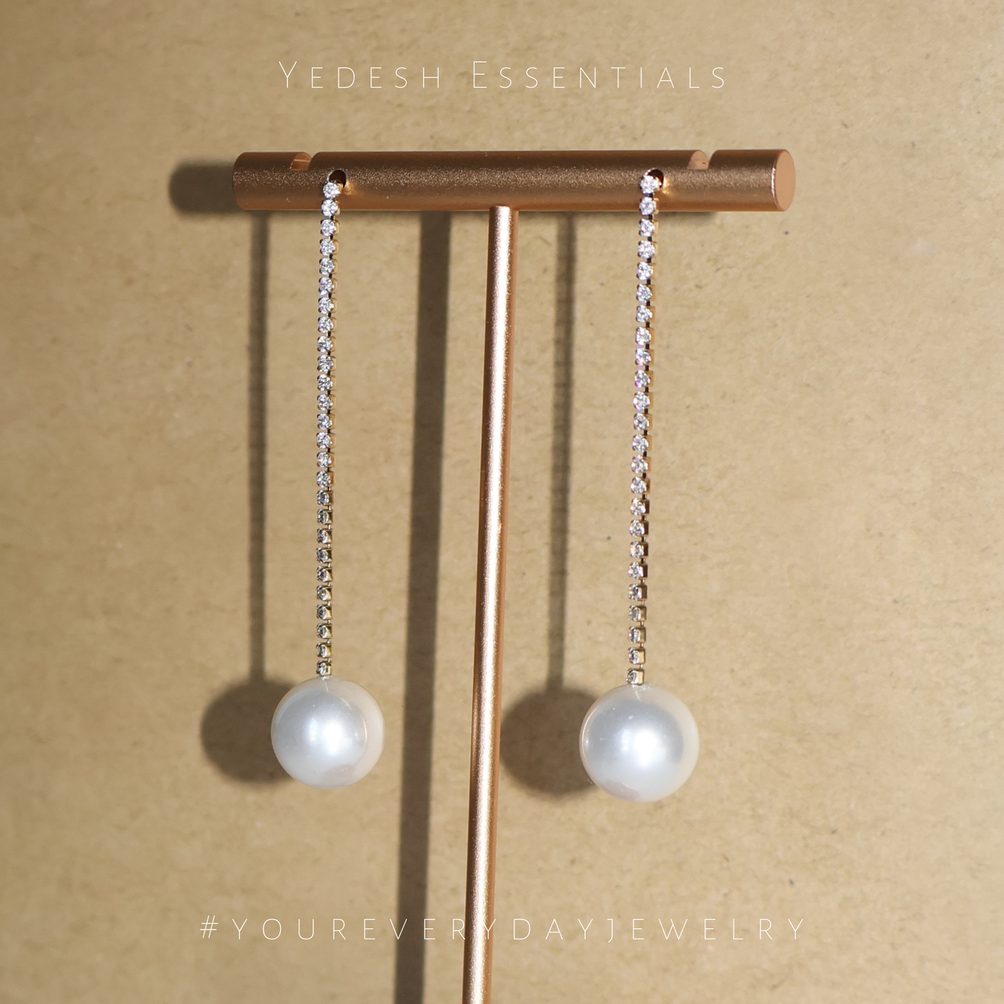 Tennis pearl drop earrings
